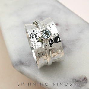 Sterling silver birthstone spinning rings form POM